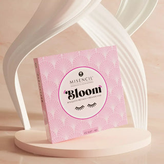 Boîtier des bouquets préfaits BLOOM Misencil présenté en mise en scène élégante pour extensions de cils volume