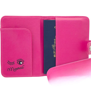 Intérieur de l’étui à passeport rose Misencil montrant compartiments de rangement.